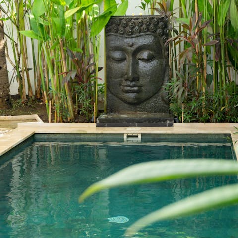 Cool off in private pool next to the Buddha fountain