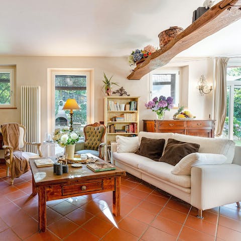 Unwind with a glass of Vermentino in the light-filled living room