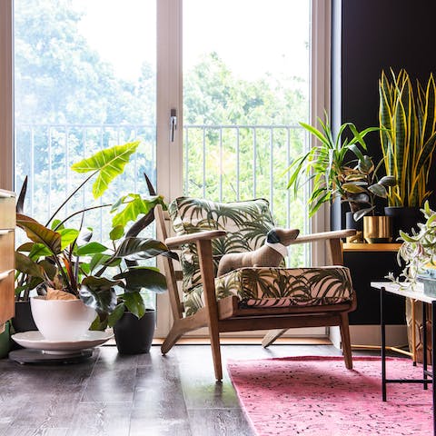 Living area with plants and art