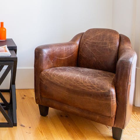 The distressed leather armchair