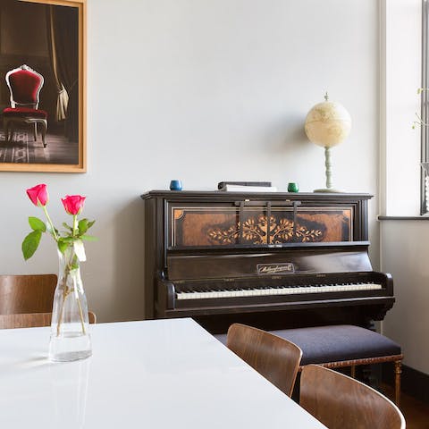 Practise your musical skills on the kitchen's classic piano