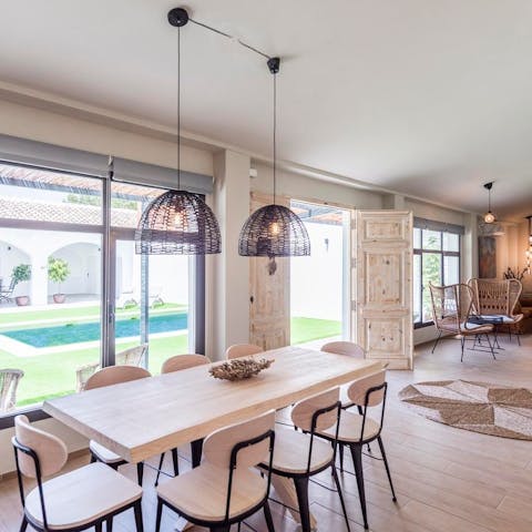 Enjoy the light-filled living and dining space and its garden views