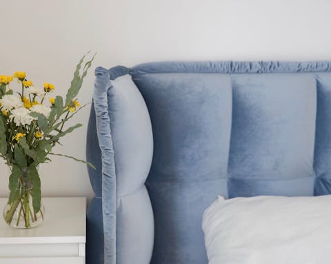 The velvet-like headboards