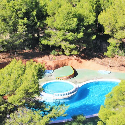 Catch some rays by the communal pool and work on your tan