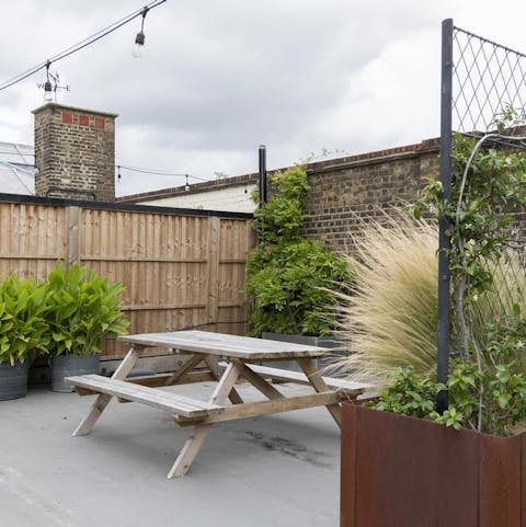 Gather together for a barbecue on the communal roof terrace