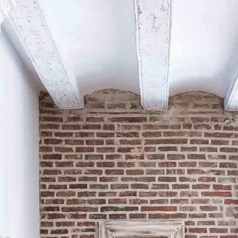 Exposed bricks and wooden beams