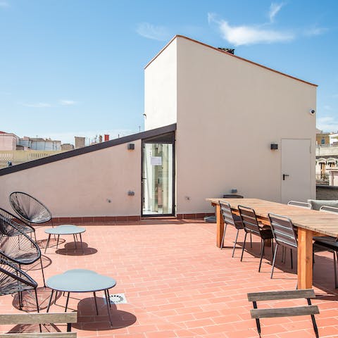 Enjoy evening meals out on the building's communal roof terrace