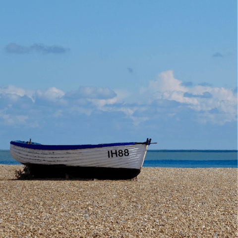 Stroll along Aldeburgh Beach, a twenty-minute drive away