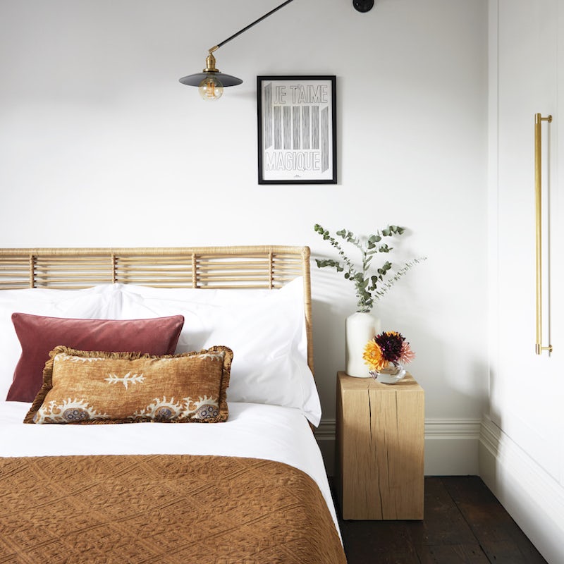 Slumber peacefully in luxurious natural fabrics and the wicker bed frame