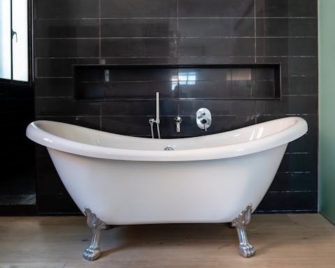 Treat yourself to a long hot soak in the freestanding tub