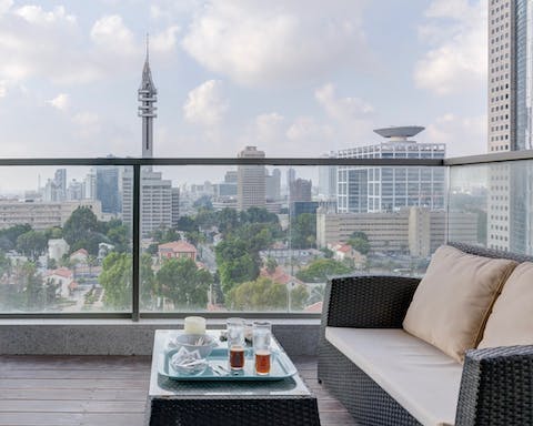 Take in sweeping views over the city from the bright and modern terrace