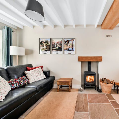 Snuggle up by the wood burner after a day exploring the local area