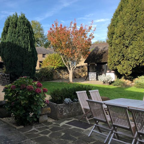 Retreat to the garden for a spot of al fresco dining