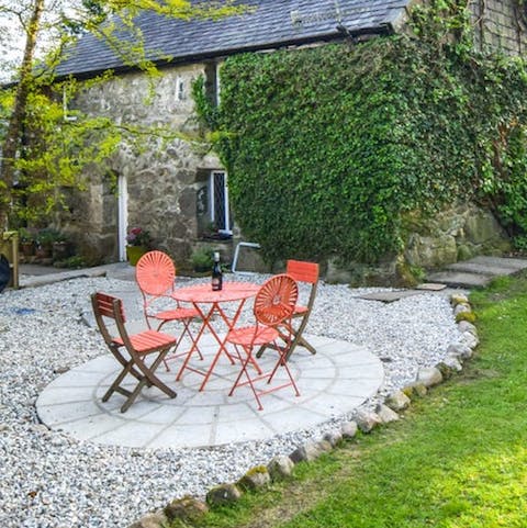 Enjoy a tipple in the luscious garden