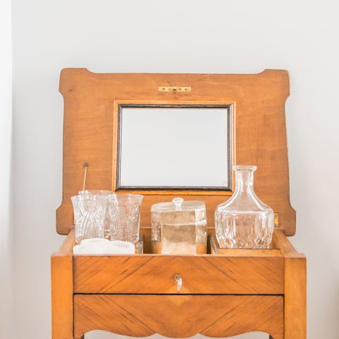 Admire the stylish drinks cabinet