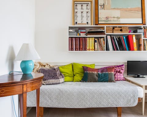 Select an art book and unwind in one of this home's cosy nooks
