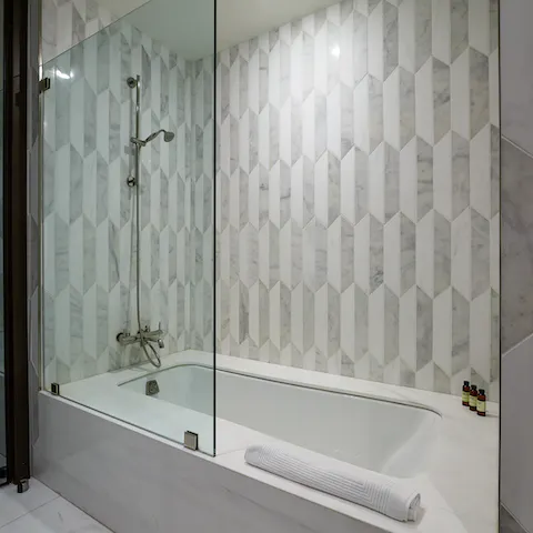 The marble bathroom and tub