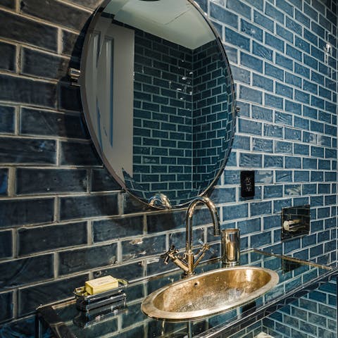 The Prussian Blue tiles and nickel fixtures