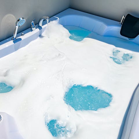 Unwind in the bubbling jacuzzi tub, after a day on Kumburnu Beach