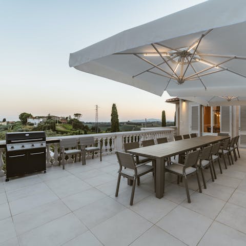 Dine alfresco with views of the Tuscan countryside