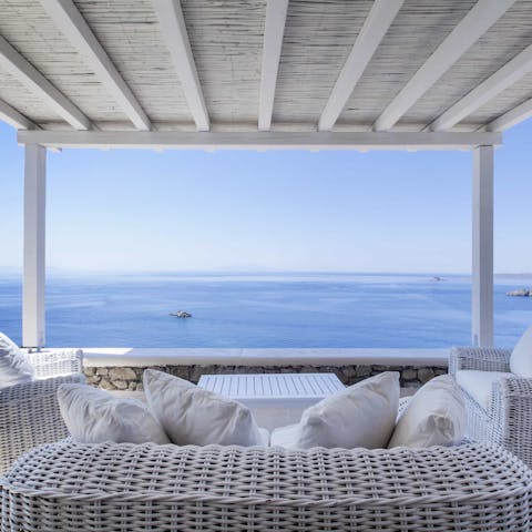 Sip your morning coffee on the balcony and look out over the blue ocean