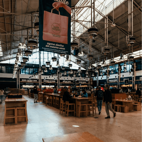 Sample traditional Portuguese cuisine in the famous Time Out Market