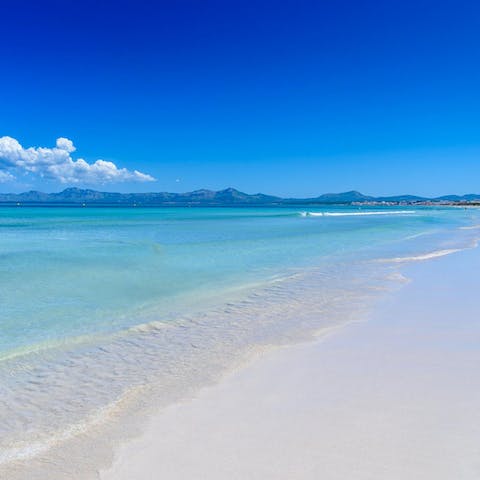 Head to the golden sands of Playa de Muro, just a short drive away
