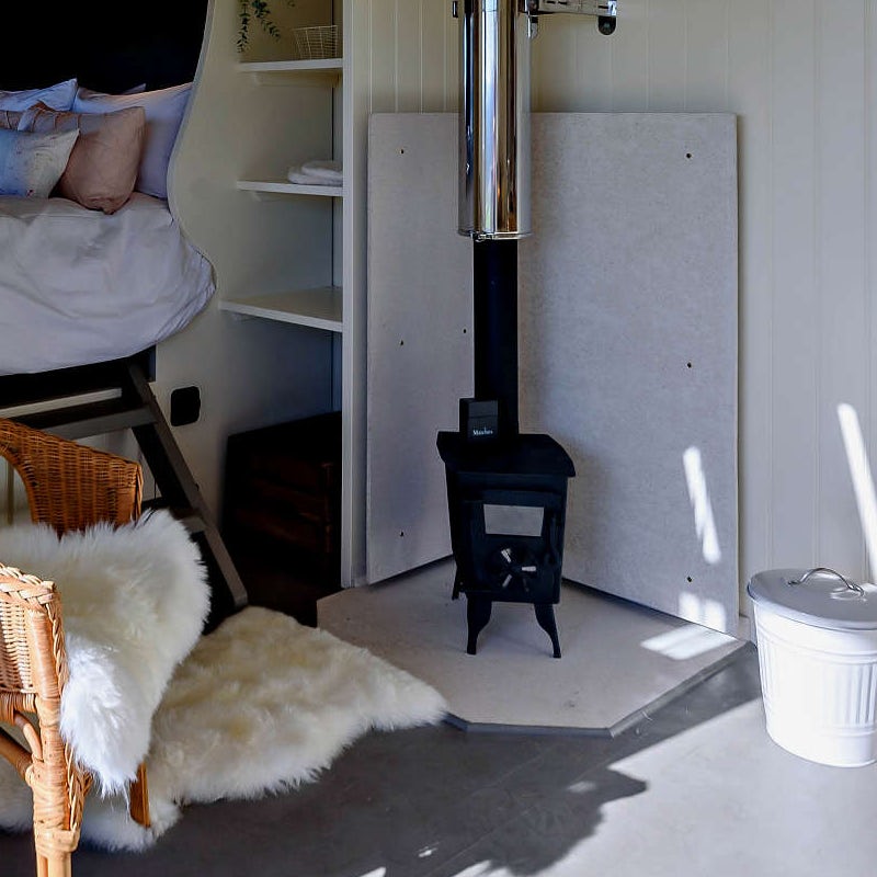 Settle in by the flame effect log burner