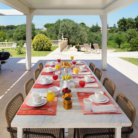 Gather for a shaded alfresco barbecue under the pergola