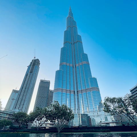Gaze across Dubai from the Burj Khalifa observation deck, a short drive away