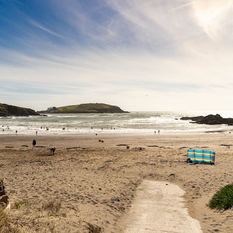 Zip up your wetsuit, grab your board and take the twenty-minute stroll to Bigbury Bitch