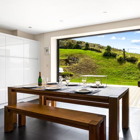 Open the bifolding doors to enjoy mealtimes with a view