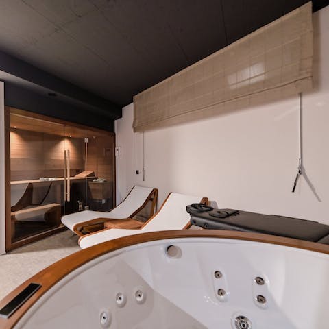 Soothe your mind and body in the wellness room, complete with whirlpool and sauna