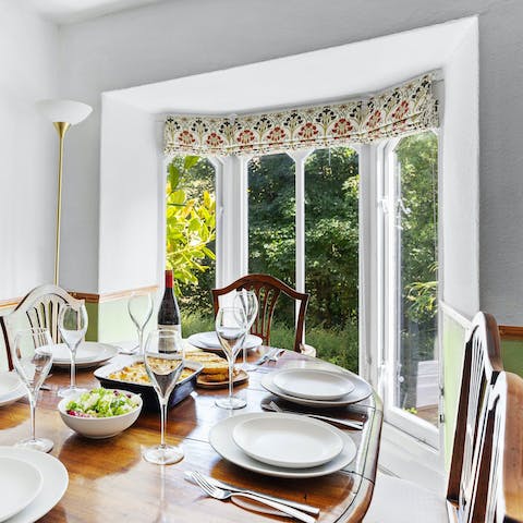 Enjoy dining in the light of Gothic-style arched windows