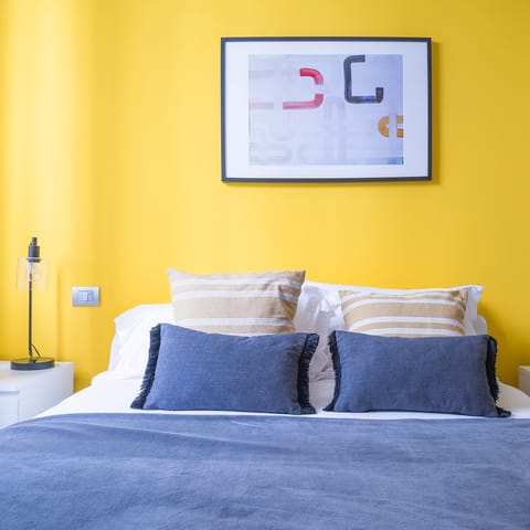 The bright yellow accent wall