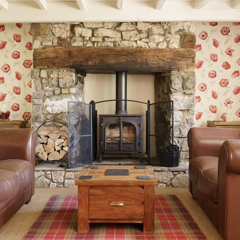 Snuggle up by the log burner on cooler evenings