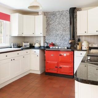 Cook in the smart kitchen, complete with a Rayburn cooker