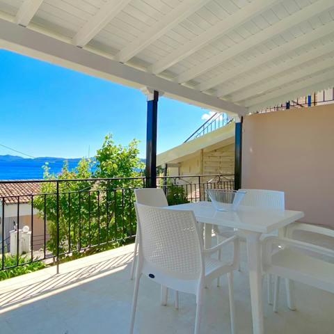 Feast on views of the Ionian Sea from your private terrace