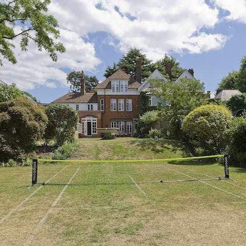 Enjoy a game of tennis on your own half-size court, in an area famous for the sport