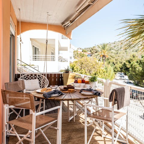 Enjoy breakfast on the sunny balcony before setting off for the day