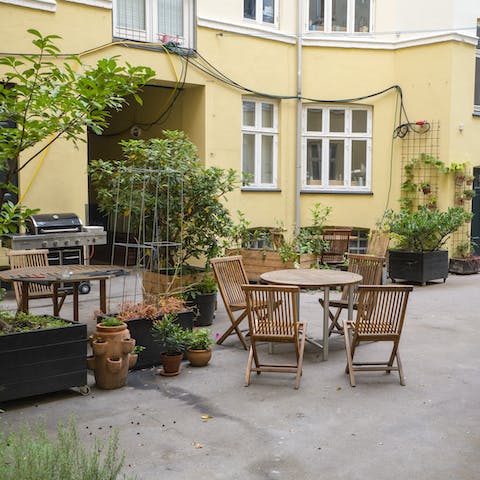 Enjoy a Danish coffee out on the charming shared courtyard