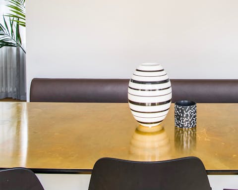 The brass top dining table