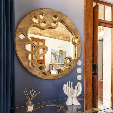 Admire the home's statement art and funky furnishings