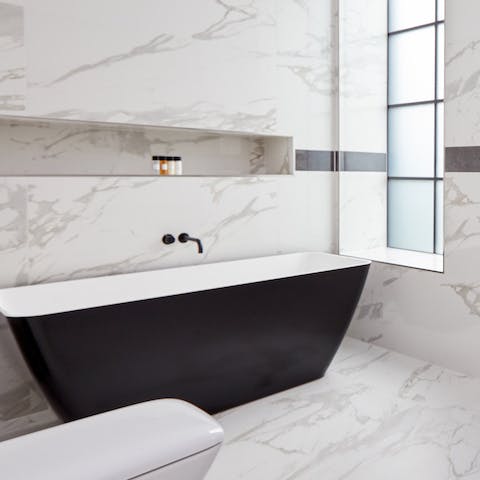 A matte black bathtub