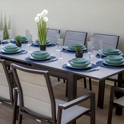 Gather everyone together and enjoy your meals alfresco by the pool under the sun