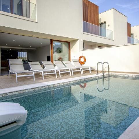 Go for a dip in the cool waters of the private pool to wash away the Albufeira heat