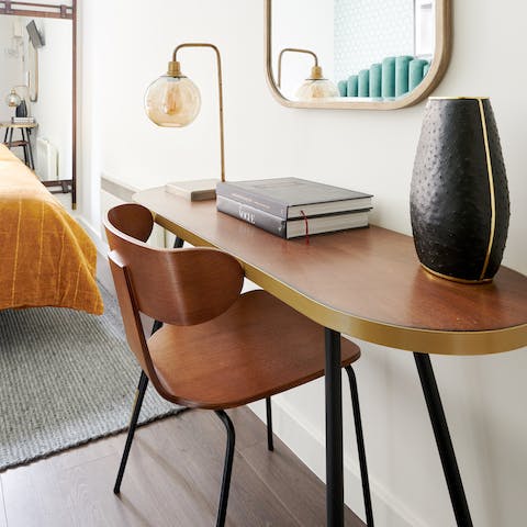 A solid oak scandi desk and chair