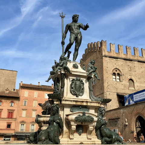 Take some photos of the Fountain of Neptune, a seven-minute walk from this home