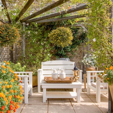 Treat yourself to a drink under the pergola