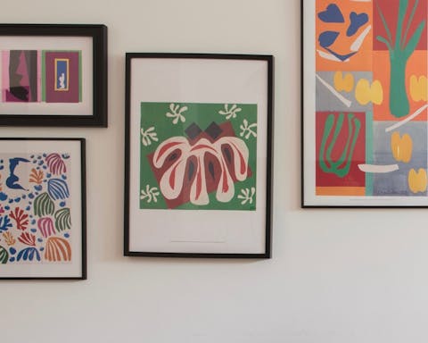 A gallery wall full of graphic art